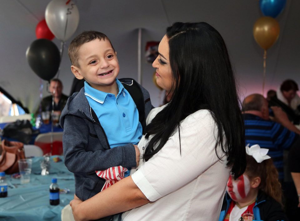 Brave Bradley with his mum Gemma at his sixth birthday party
